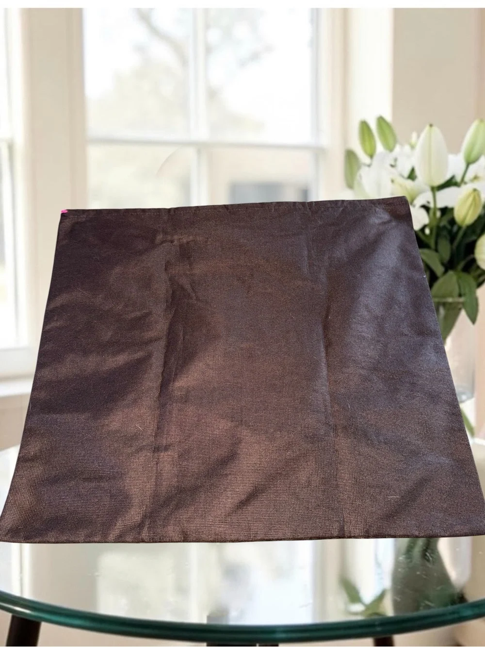 Kate Spade New York brown textured story book bust bag with gold writing 17x19